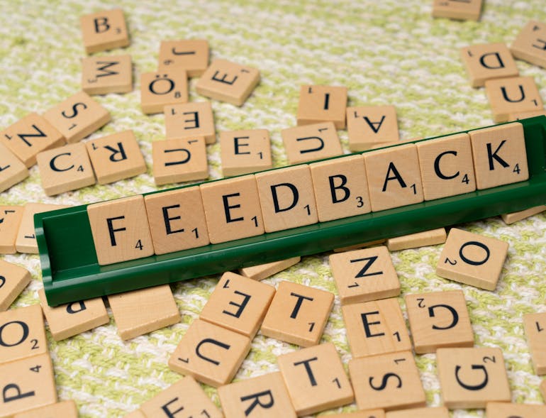 Scrabble letters forming the word feedback
